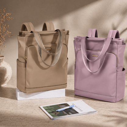 Two bags, one beige and one purple, on a neutral background with a magazine and pen.