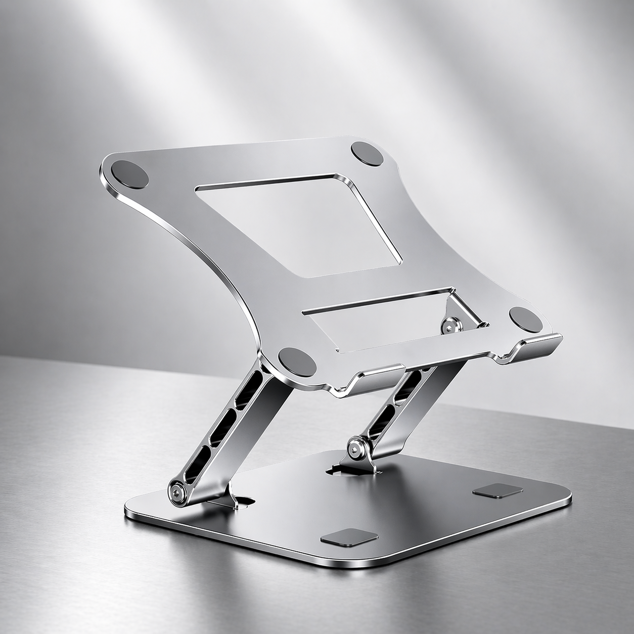 Metallic laptop stand on a reflective surface with a gradient background