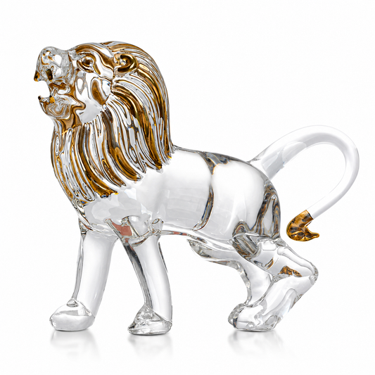 Glass lion figurine with gold accents on a white background