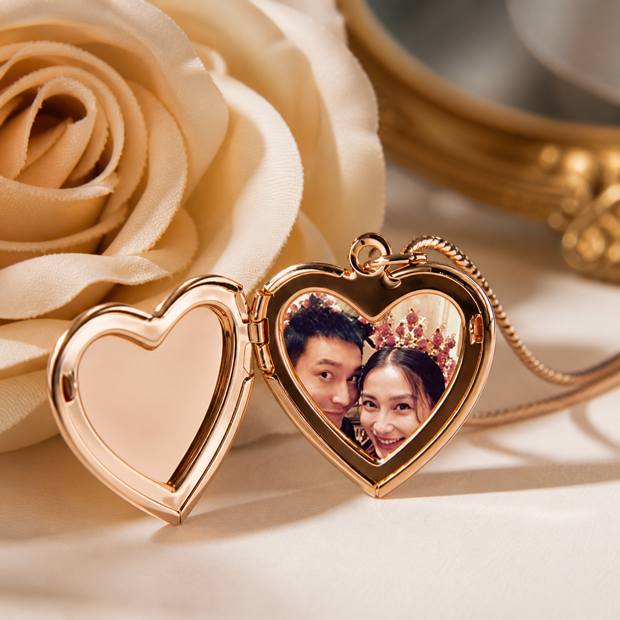 Heart-shaped locket with a couple's photo on a light background