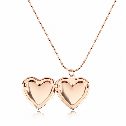 Rose gold heart-shaped locket necklace on a white background