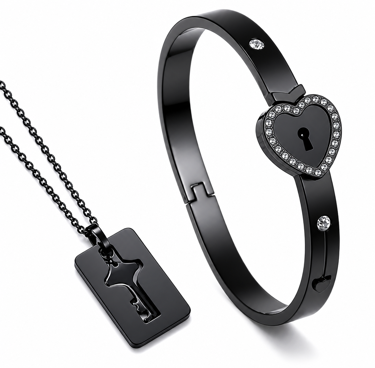 Black heart-shaped lock bracelet with key pendant necklace on a white background