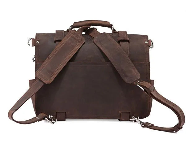 Brown leather backpack with straps on a white background