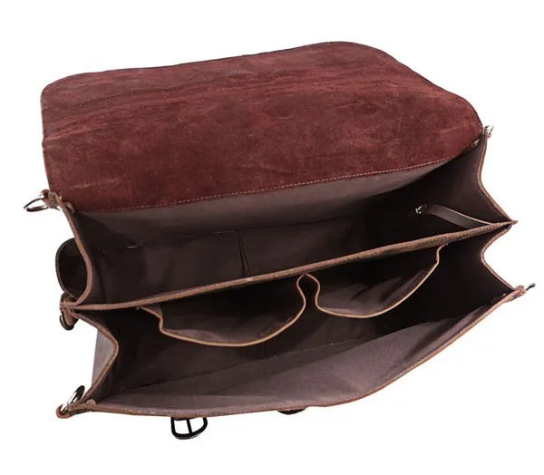 Brown leather bag with open compartments on a white background