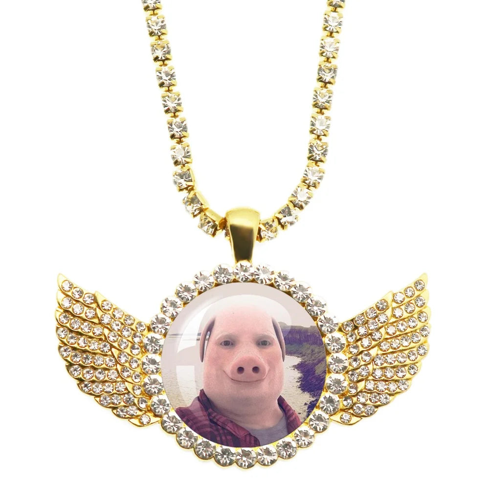 Necklace with a pendant featuring a person's face and wings on a white background