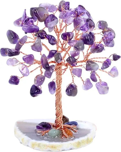Amethyst crystal tree on a white background