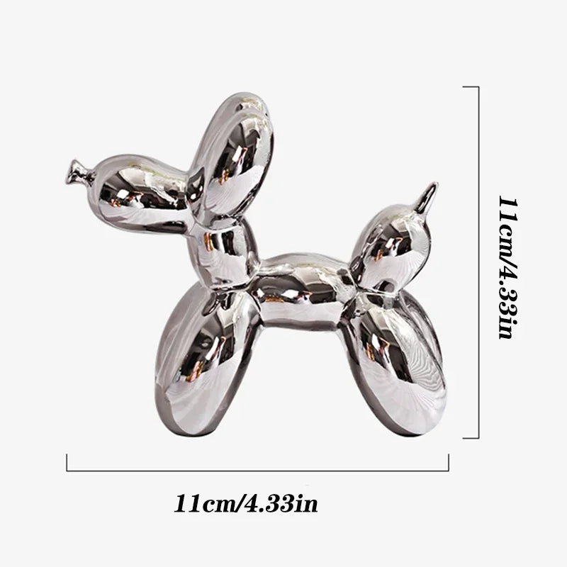 Metallic balloon dog sculpture with dimensions on a white background