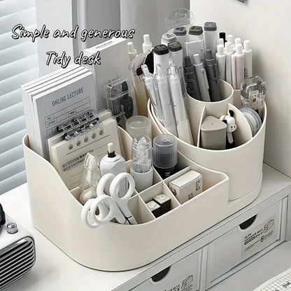 Organized desk with stationery items in a white holder.