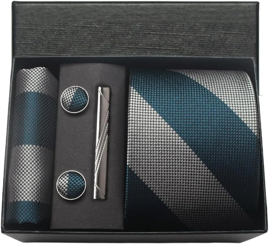 Groomsmen gift set with tie, pocket square, cufflinks, and pen in a black box.