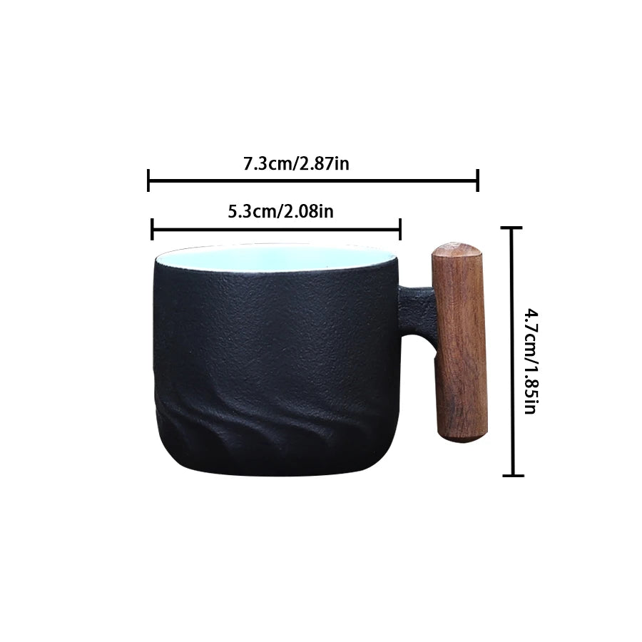 Black mug with wooden handle and measurements on a white background