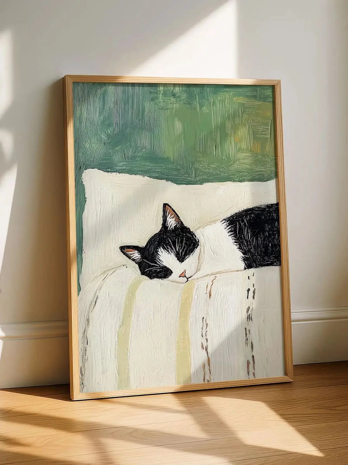 Framed painting of a black and white cat on a textured surface