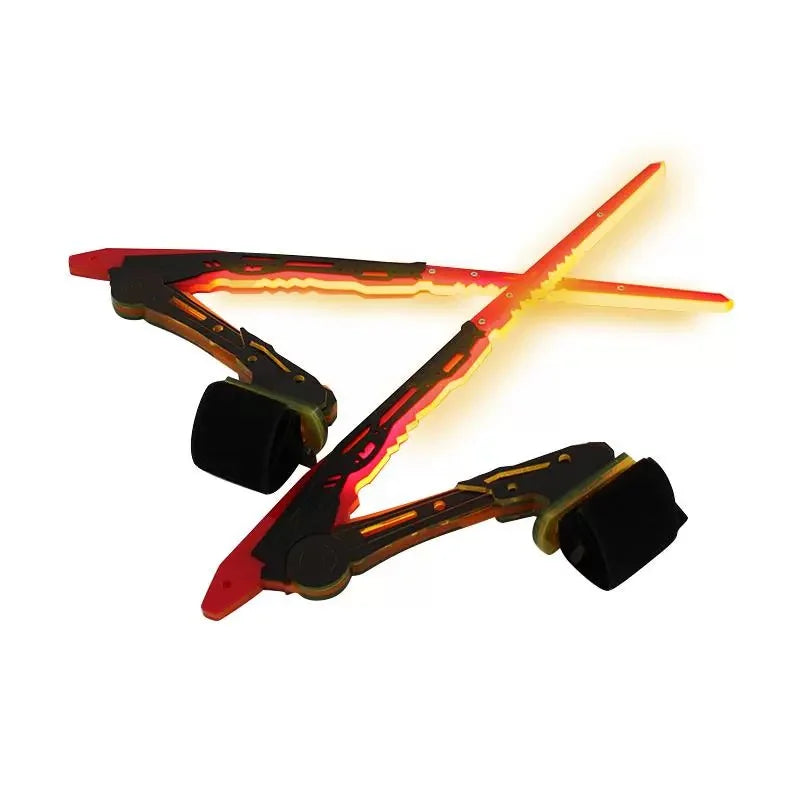 Light-up butterfly toy with glowing orange and red wings on a white background