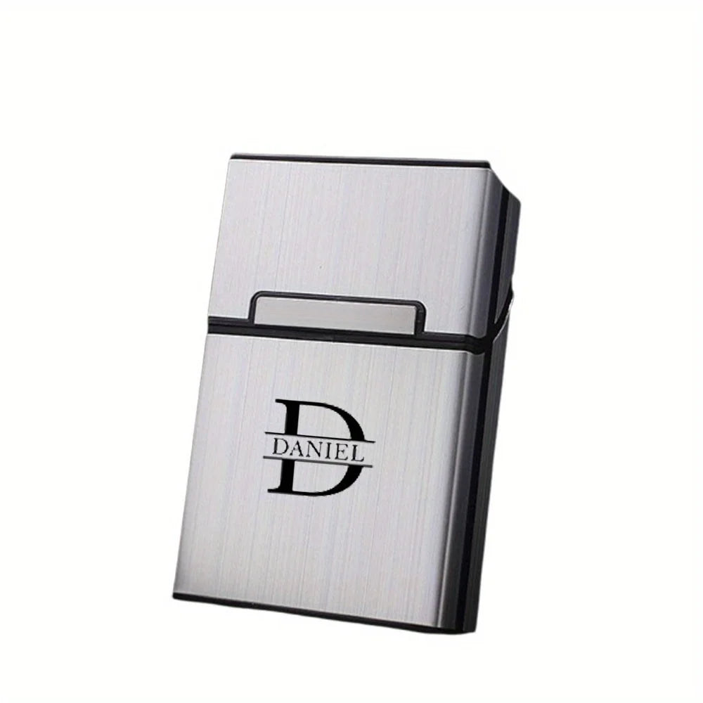 Silver business card holder with 'DANIEL' branding on a white background