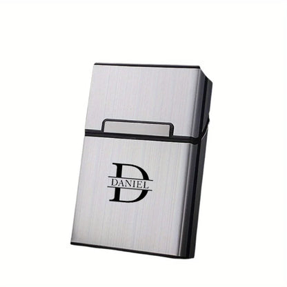 Silver business card holder with 'DANIEL' branding on a white background