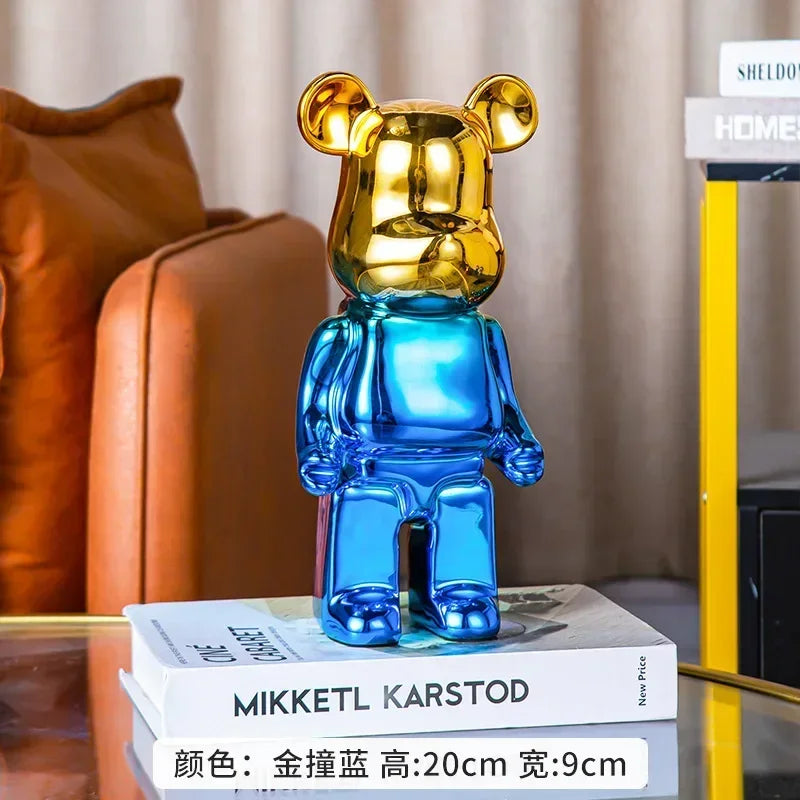 Blue and gold bear-shaped lamp on a stack of books with a blurred background