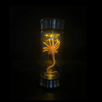 Decorative lamp with a glowing interior design on a black background