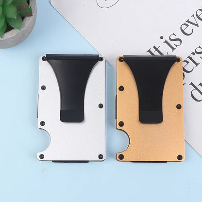 Two minimalist wallets, one white and one beige with black card holders, on a light blue surface.