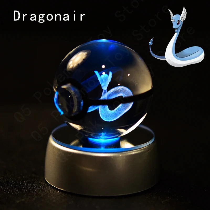 Crystal ball with blue light and Dragonair illustration on a dark background
