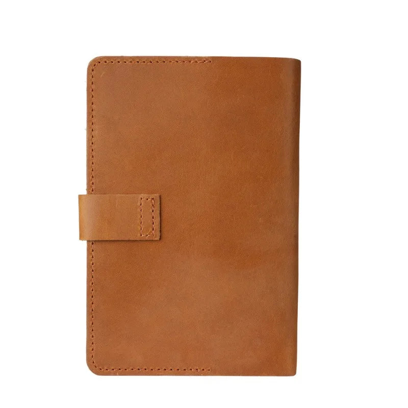 Brown leather notebook on a white background