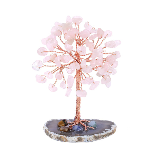 Decorative tree with pink stones on a white background