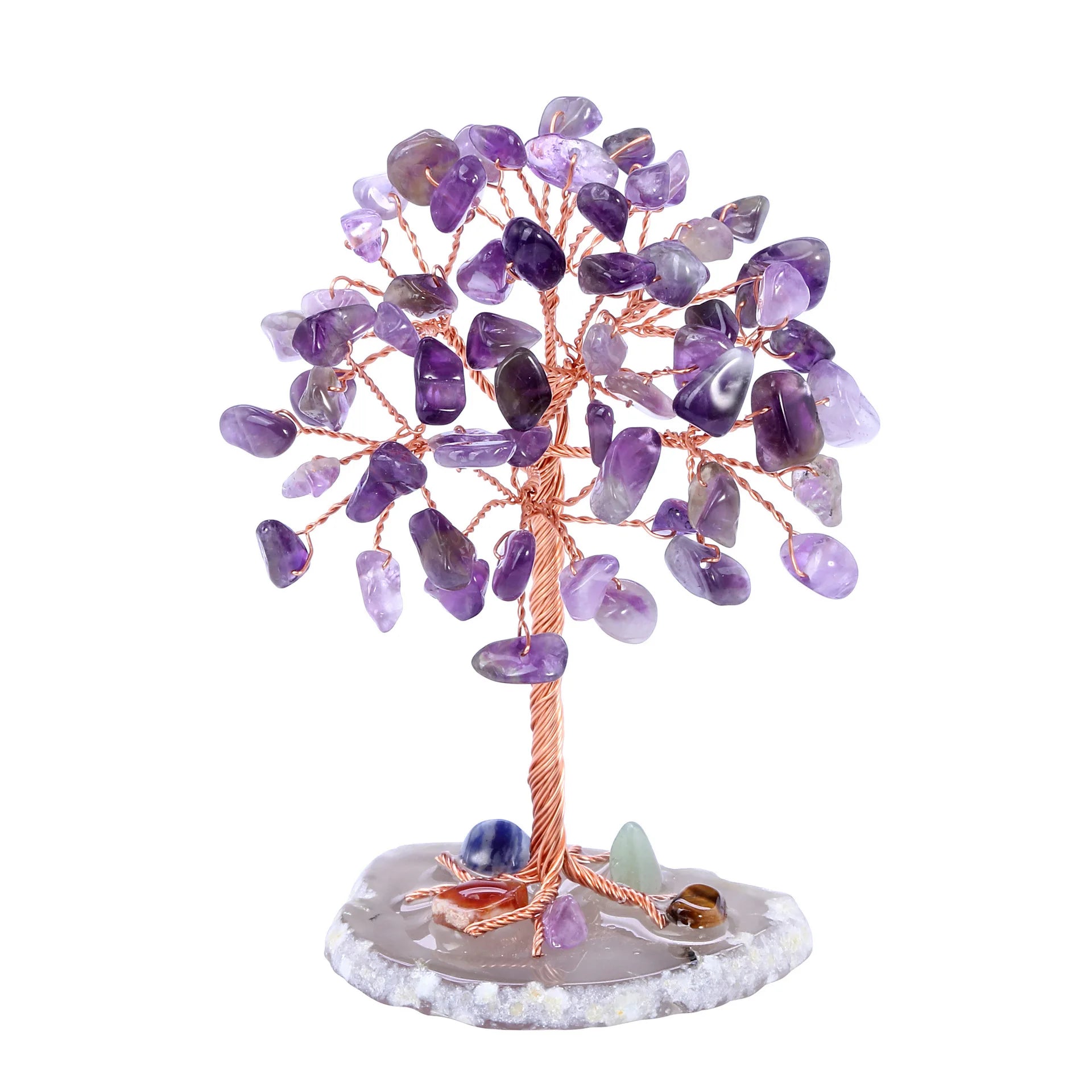 Crystal tree with purple stones on a white background