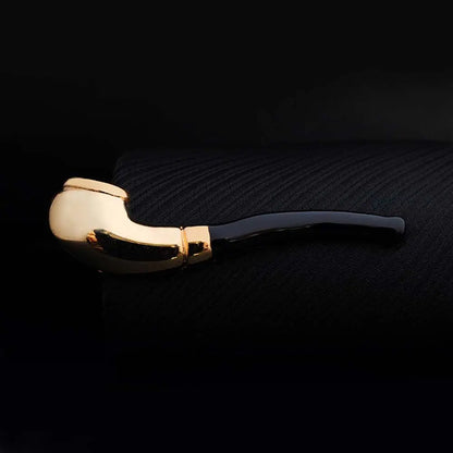 Gold and black pipe on a dark textured background