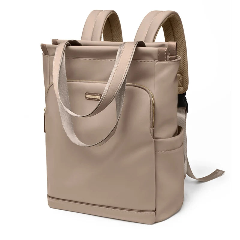 Beige tote bag with backpack features on a white background