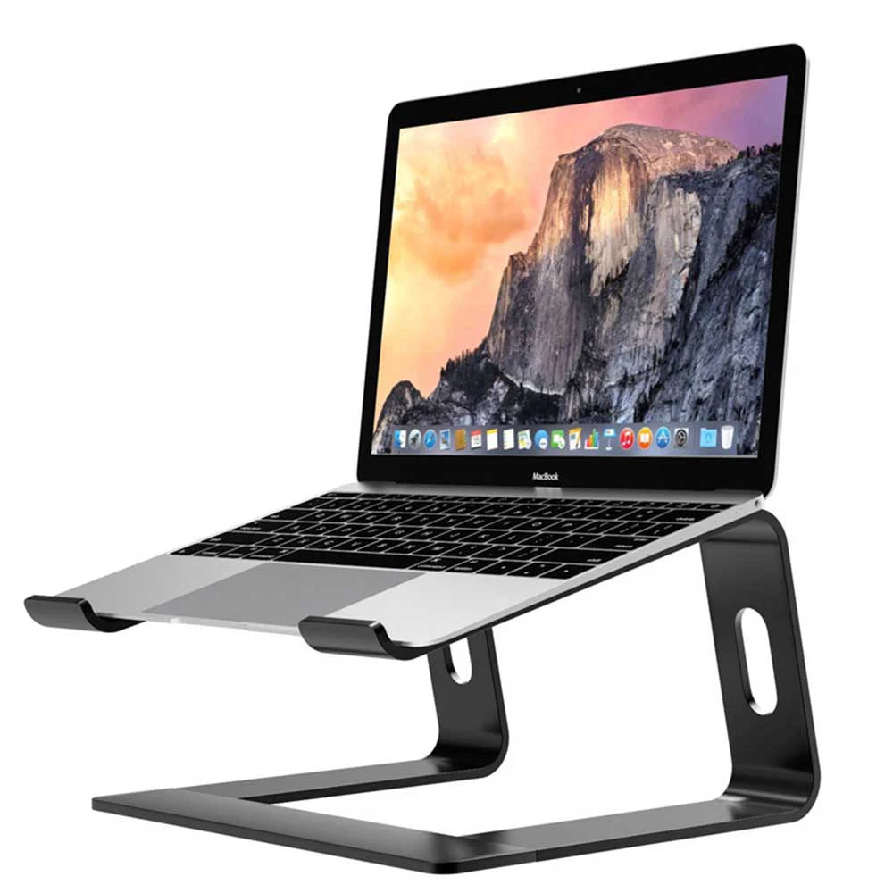 Laptop on a stand with a scenic wallpaper displayed on the screen