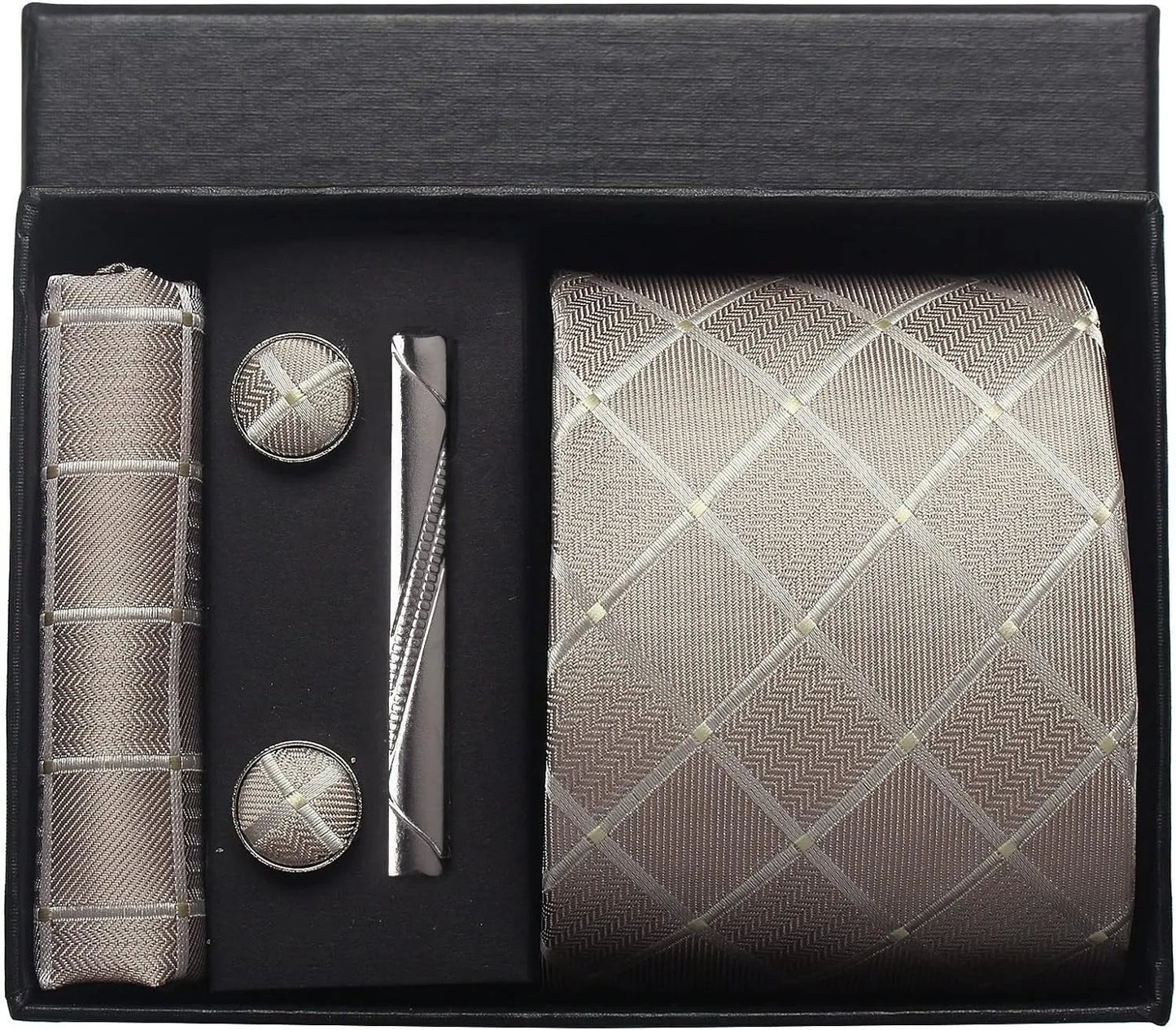 Set of men's accessories including a tie, pocket square, cufflinks, and pen in a black box.