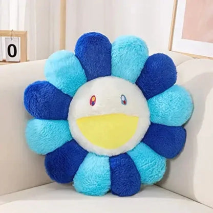 Flower-shaped plush toy with a face on a white surface