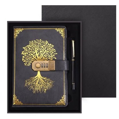 Black notebook with gold tree design and combination lock, accompanied by a pen, in a black box.
