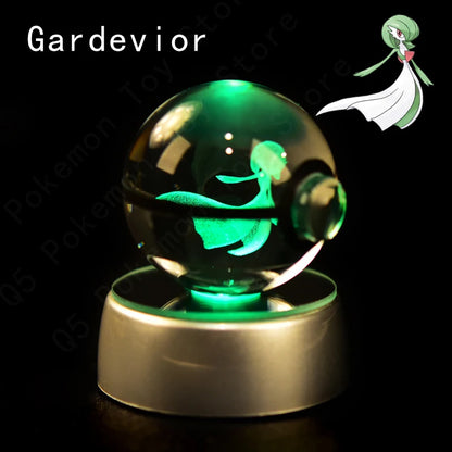 Crystal ball with Gardevior figure inside, glowing green on a black background