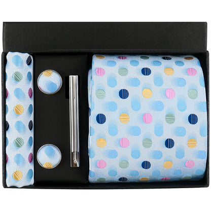 Polka dot tie set with tie, pocket square, cufflinks, and pen in a black box.