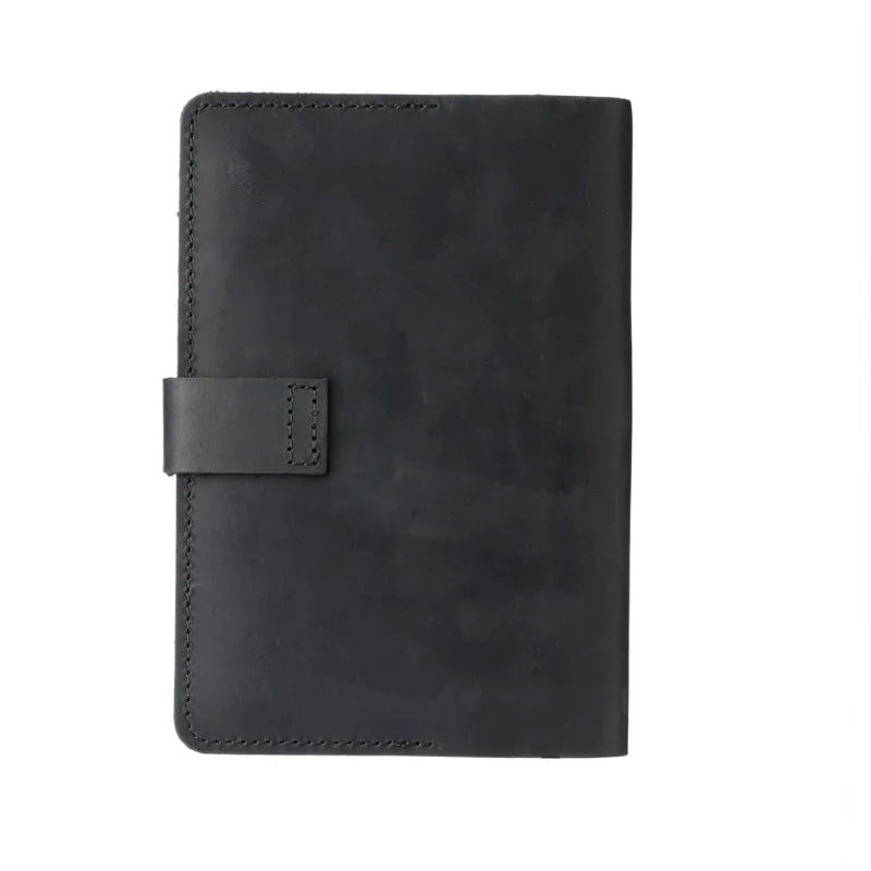 Black leather notebook with a strap on a white background