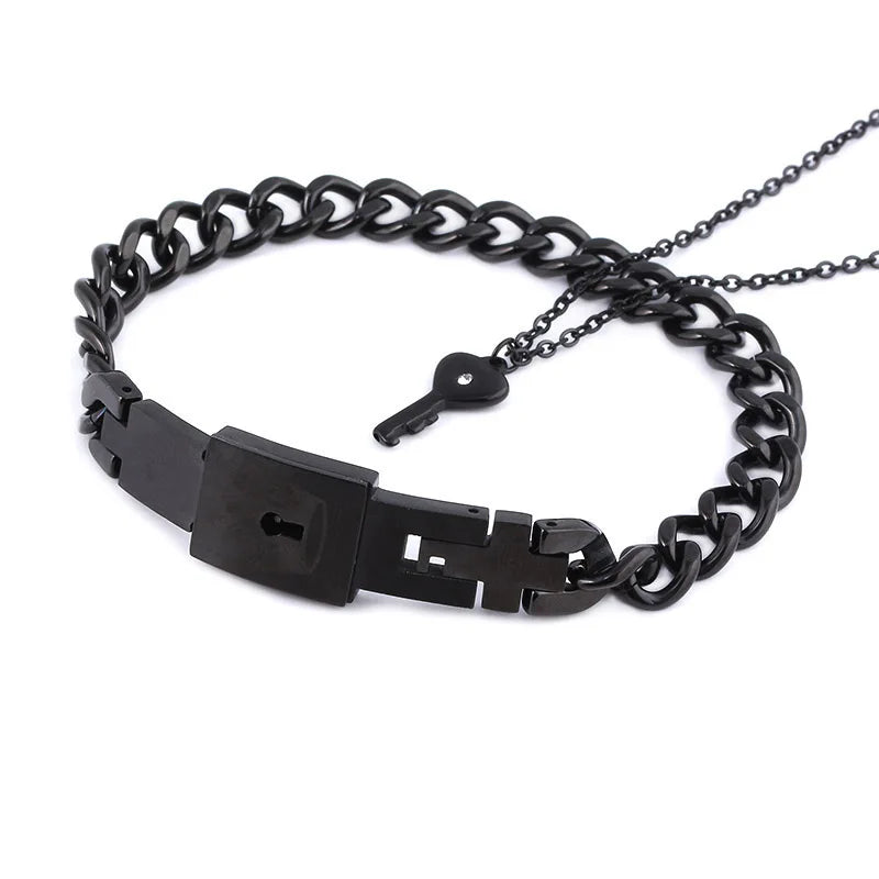 Black chain belt with key design on a white background