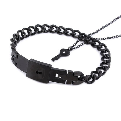 Black chain belt with key design on a white background