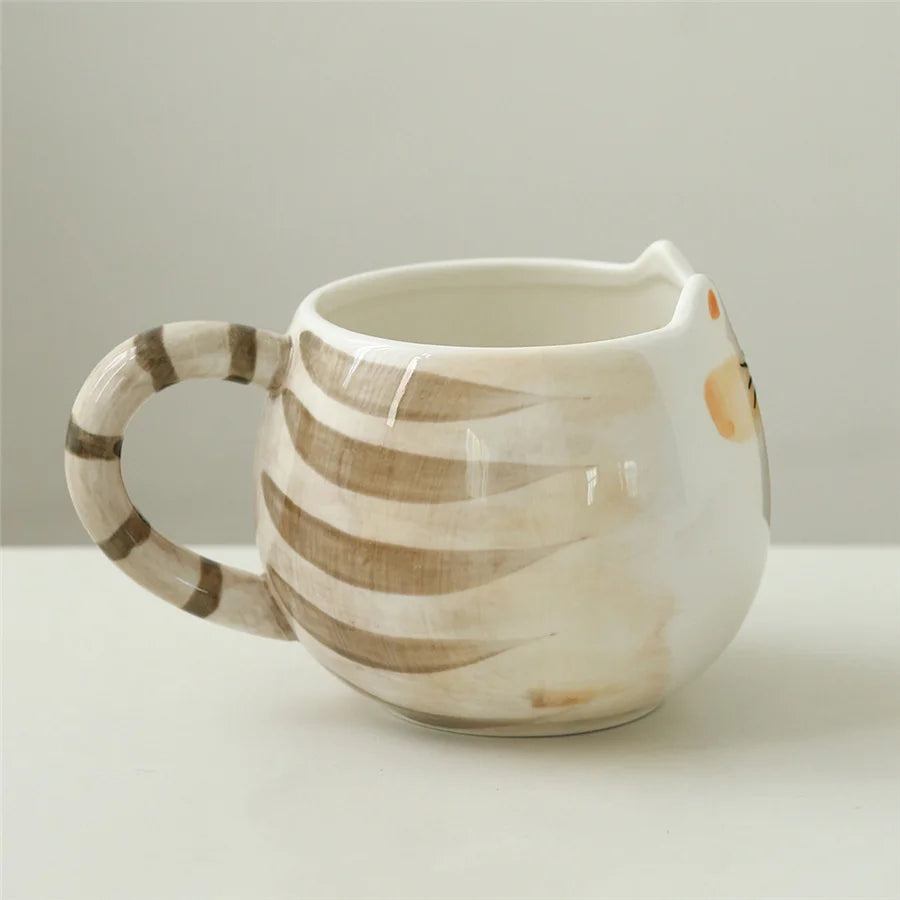 Ceramic mug with striped design on a light background