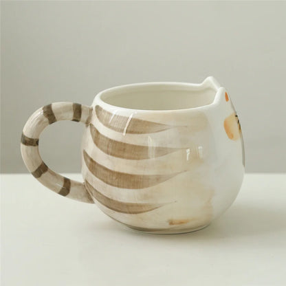 Ceramic mug with striped design on a light background