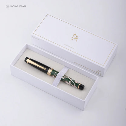 Green and gold pen in a white box with 'HONG DIAN' branding.