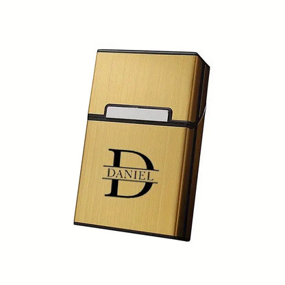 Gold business card holder with 'DANIEL' branding on a white background