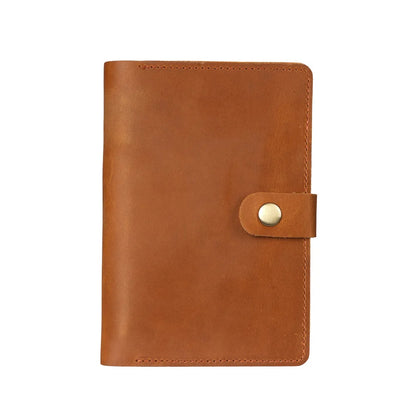 Brown leather wallet with a gold buckle on a white background