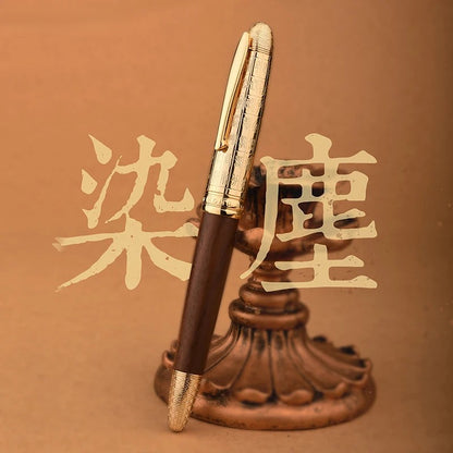 Gold and brown pen on a decorative stand with Chinese characters on a brown background
