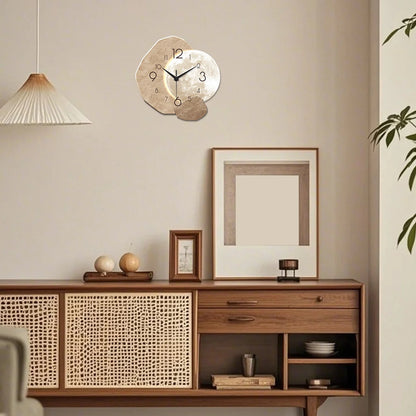 Wooden sideboard with decorative items against a beige wall