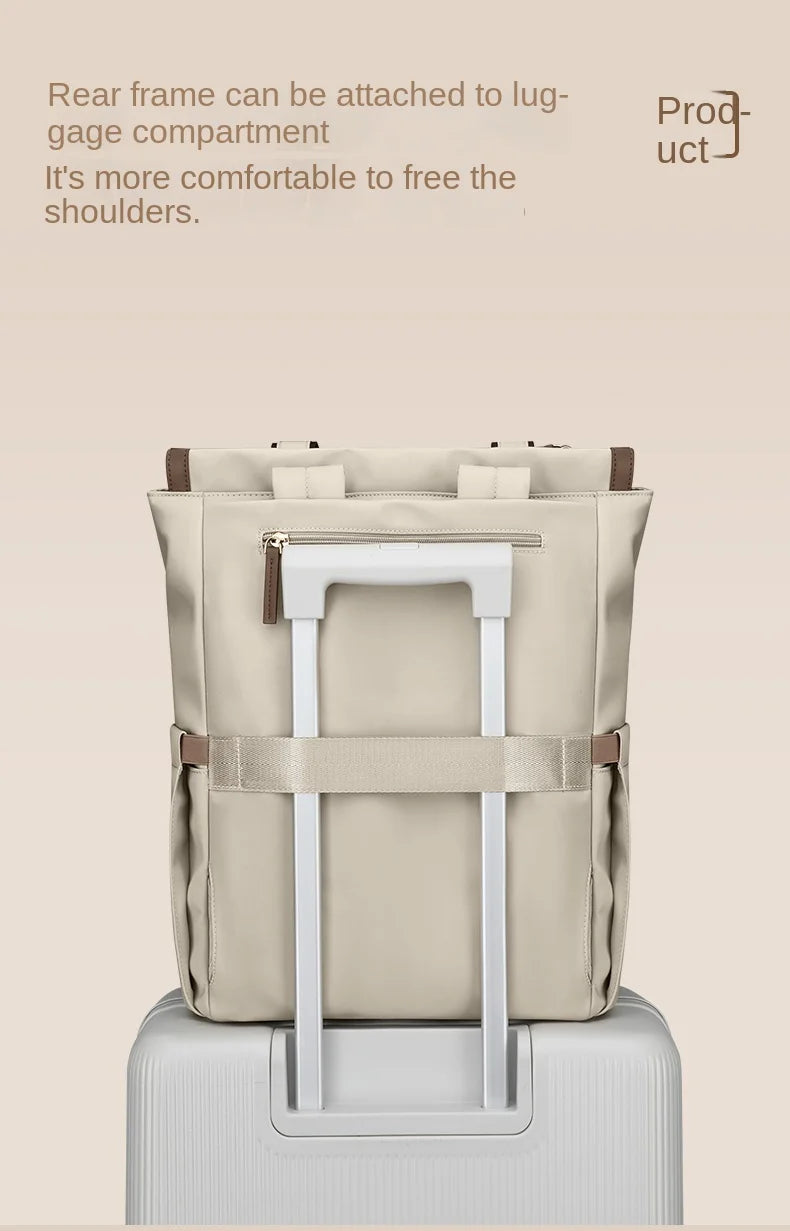 Beige backpack with a luggage compartment attachment on a beige background