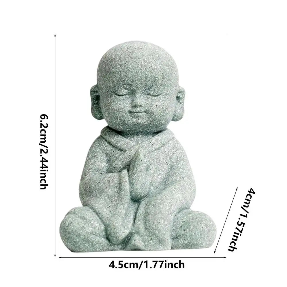 Small stone statue of a seated figure with dimensions indicated on a white background