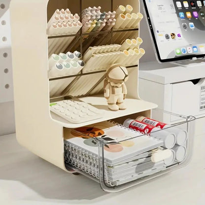 Desk organizer with stationery items and a tablet on a white surface