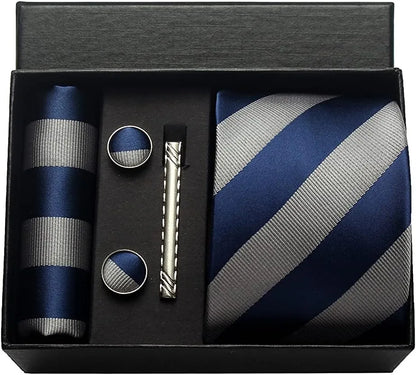 Men's tie set with striped tie, pocket square, cufflinks, and tie clip in a black box.