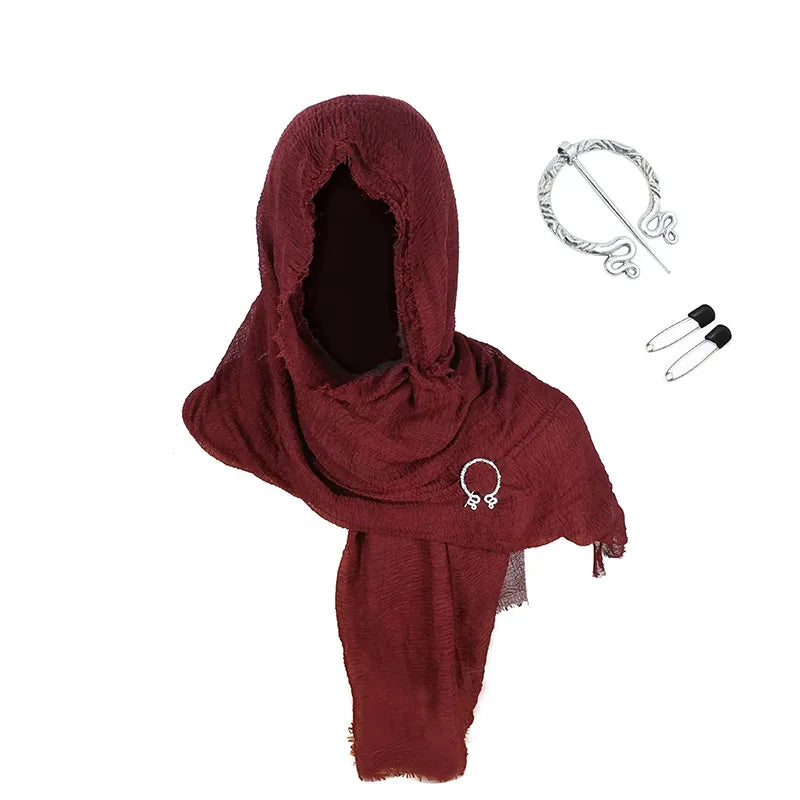 Red hooded garment with accessories on a white background