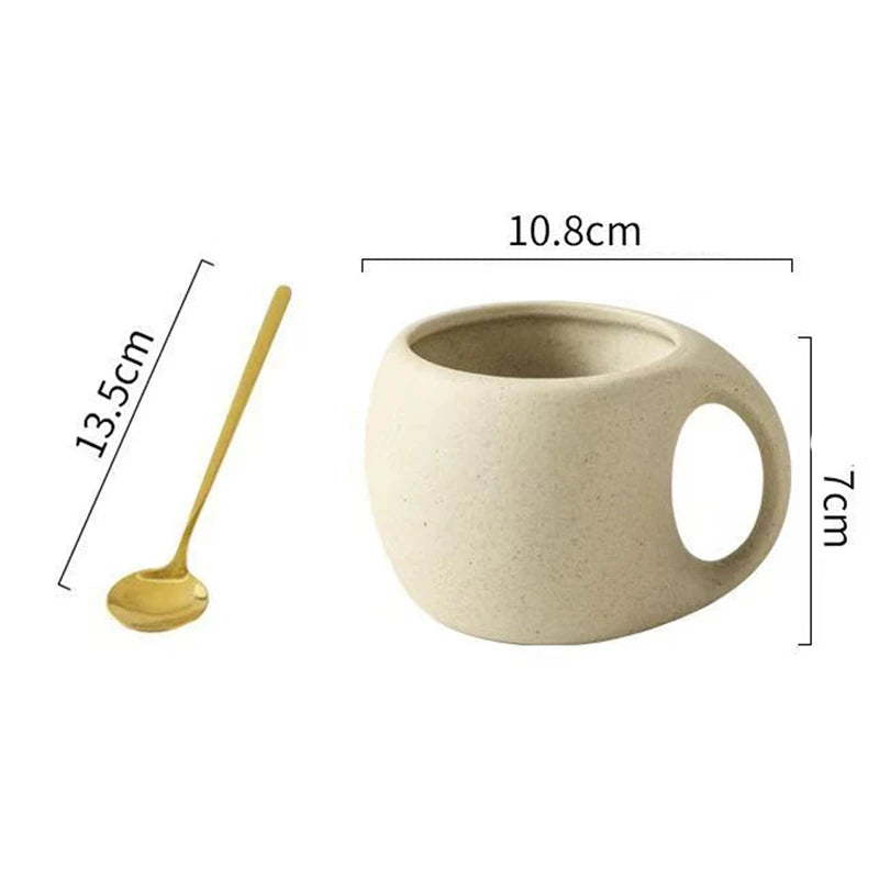 Beige ceramic mug with dimensions labeled on a white background