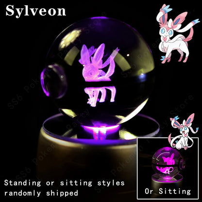 Sylveon figurine in a crystal ball with additional images of Sylveon on a dark background